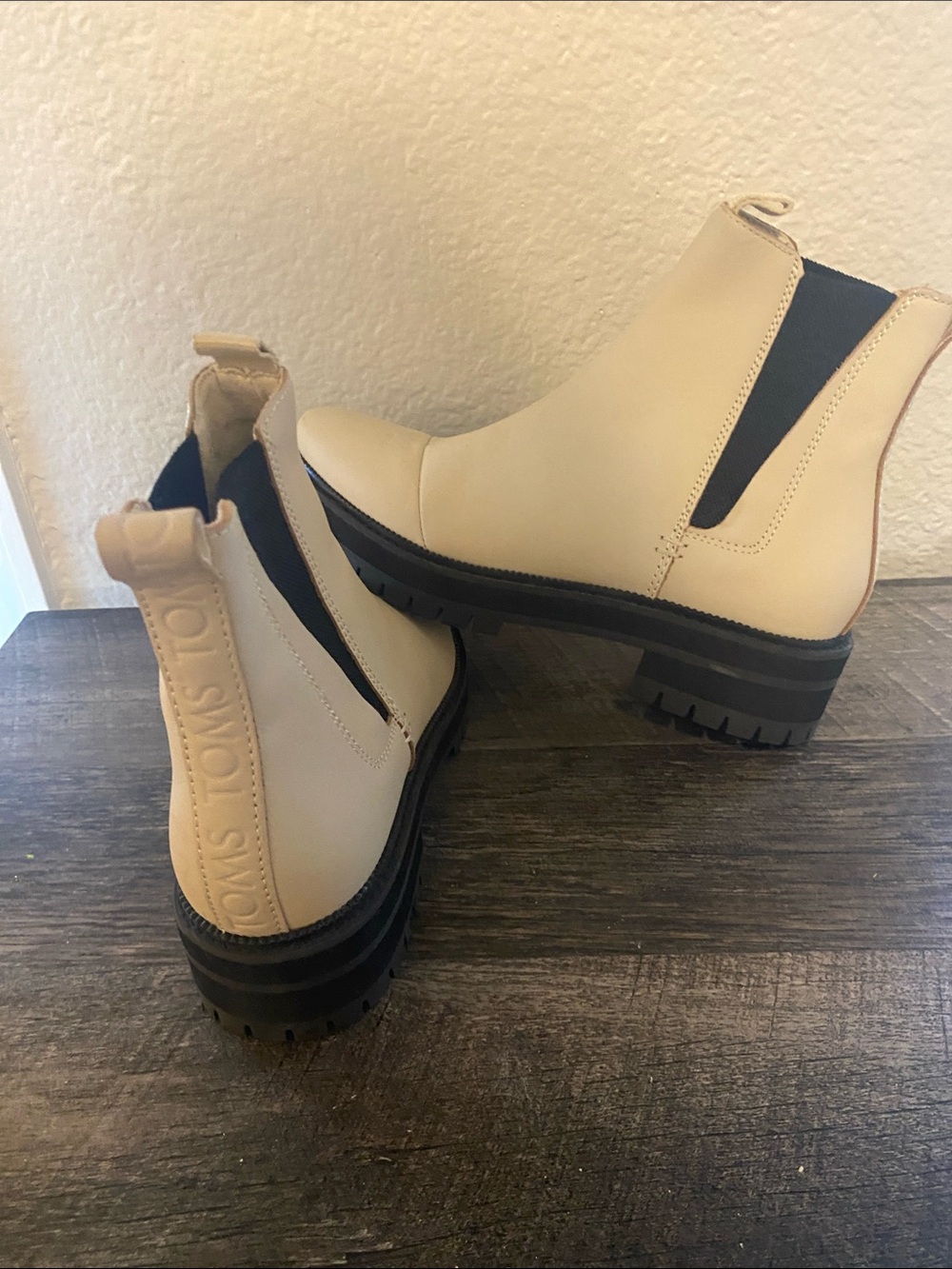 TOMS Women's Lug-Sole Chelsea Booties in Cream with Black Elastic